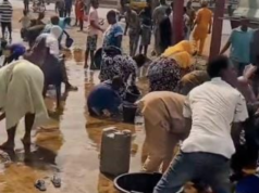 Ibadan Residents Defy Danger, Scoop Fuel From Fallen Tanker