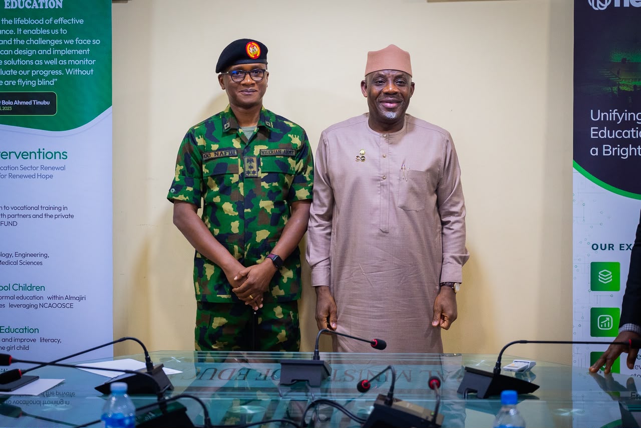 Minister of Education, Dr Maruf Tunji Alausa(R); Director-General of the National Youth Service Corps, Brig. Gen. Olakunle Nafiu(L) during a visit in Abuja
