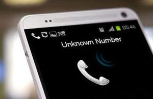 NCC Flags Revenue, Security Risks as Call Masking Resurges Phone screen displaying unknown caller to depict call masking