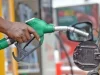Petrol Nears N1,500 In Abuja As Dangote Raises Gantry Price Petrol pump dispensing fuel at a feeling station