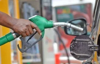 Petrol Nears N1,500 In Abuja As Dangote Raises Gantry Price Petrol pump dispensing fuel at a feeling station