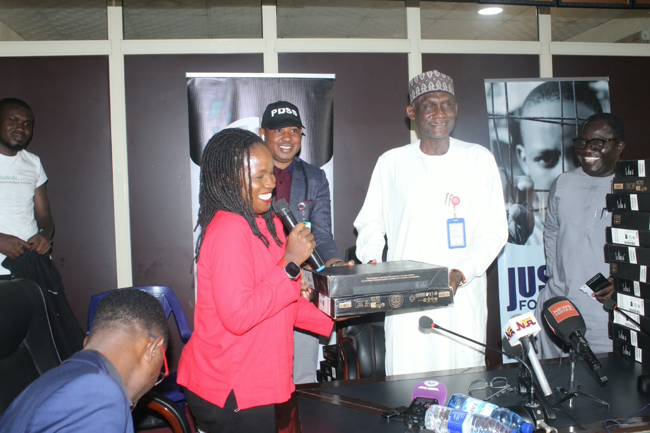 PPDC Chief Executive Officer, Lucy James Abag, handing over the laptops to the Director-General of LACON, Aliyu Bagudu Abubakar, in Abuja on wednu