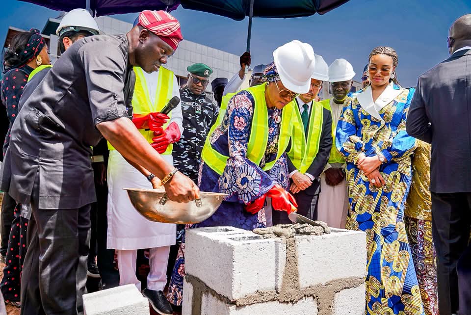 First Lady Oluremi Tinubu laying the foundation for the construction of the $10.4 million Renewed Hope Innovation Hub, in Abuja on Friday 