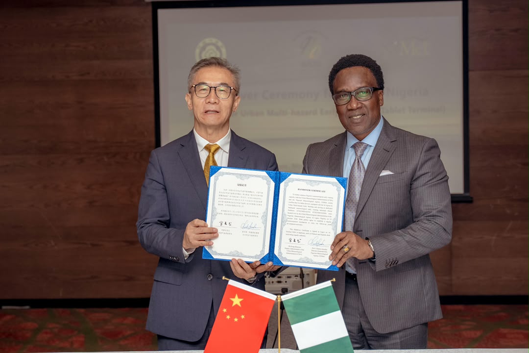L-R: China Meteorological Administration Deputy Administrator, Song Shanyun;Director-General NiMet and Permanent Rep. of Nigeria with WMO, Prof. Charles Anosike